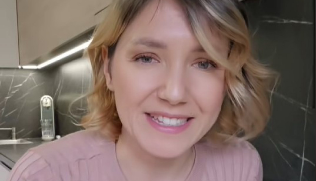 žena